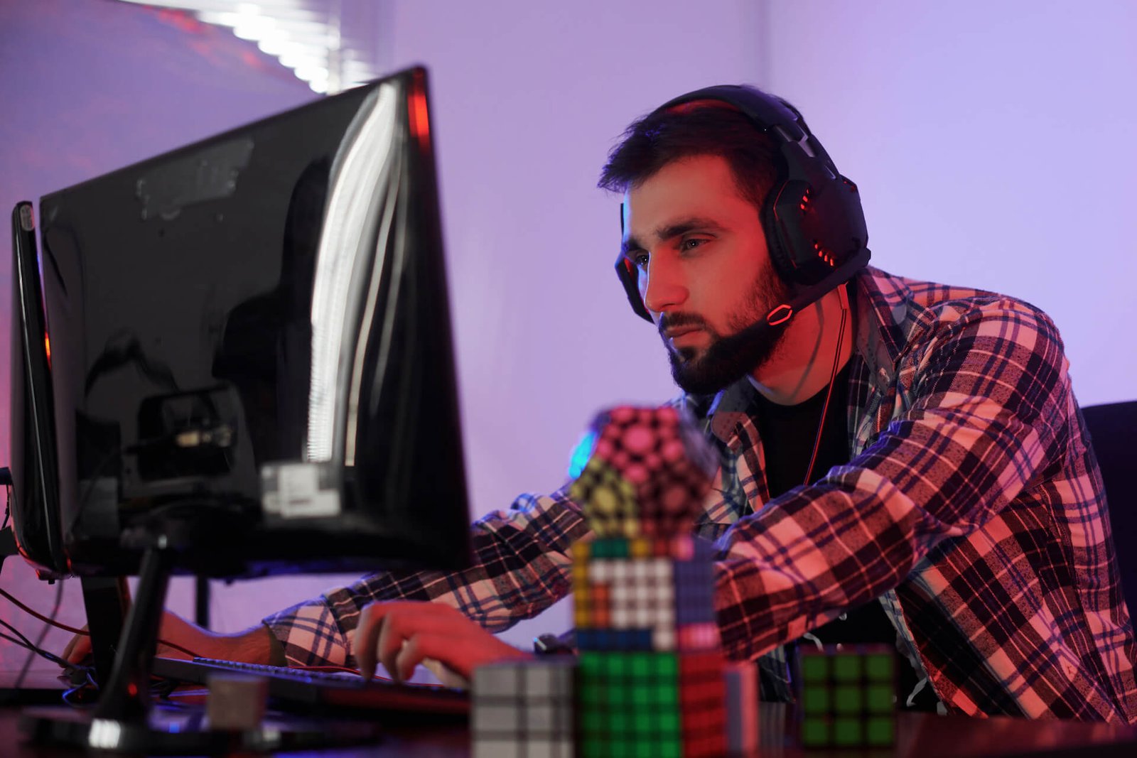 portrait-of-young-bearded-pro-gamer-playing-in-onl-2021-08-30-08-05-29-utc.jpg